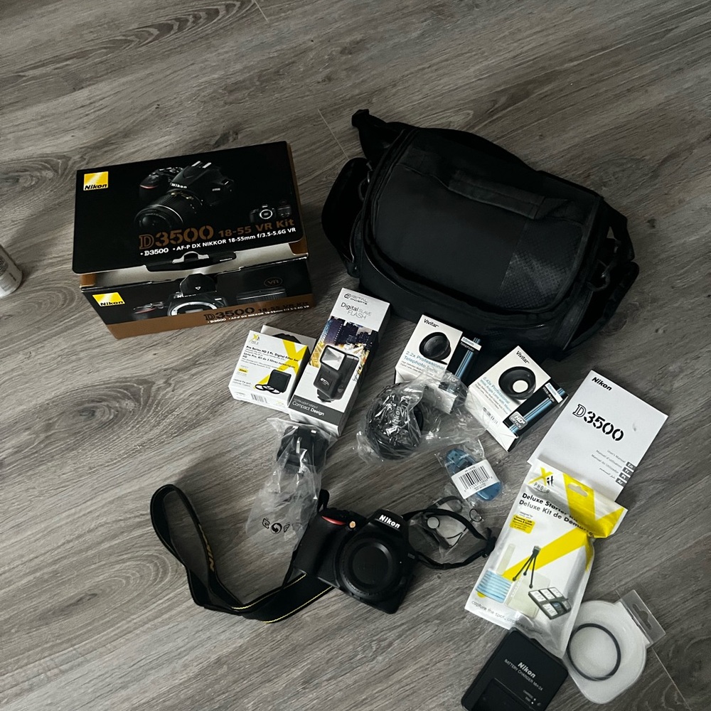 Nikon D3500 Black DSLR Camera Kit plus more accessories. Never used